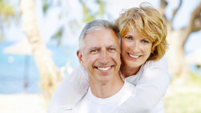 couple with tooth replacement